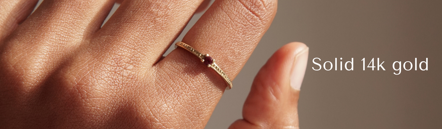 solid 14k gold ring with red stone