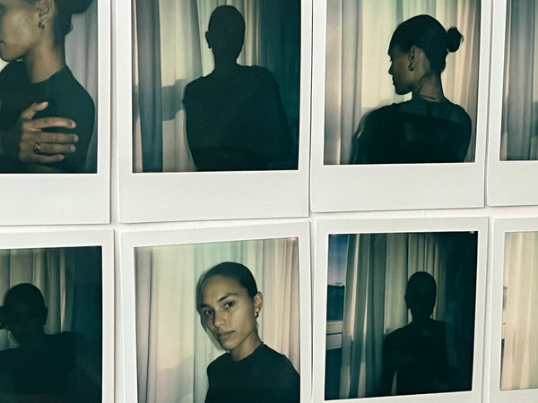 Grid of polaroid-style images showcasing a model in minimalist jewelry, featuring simple gold earrings. The images emphasize a modern, artistic aesthetic that complements a clean and timeless style.