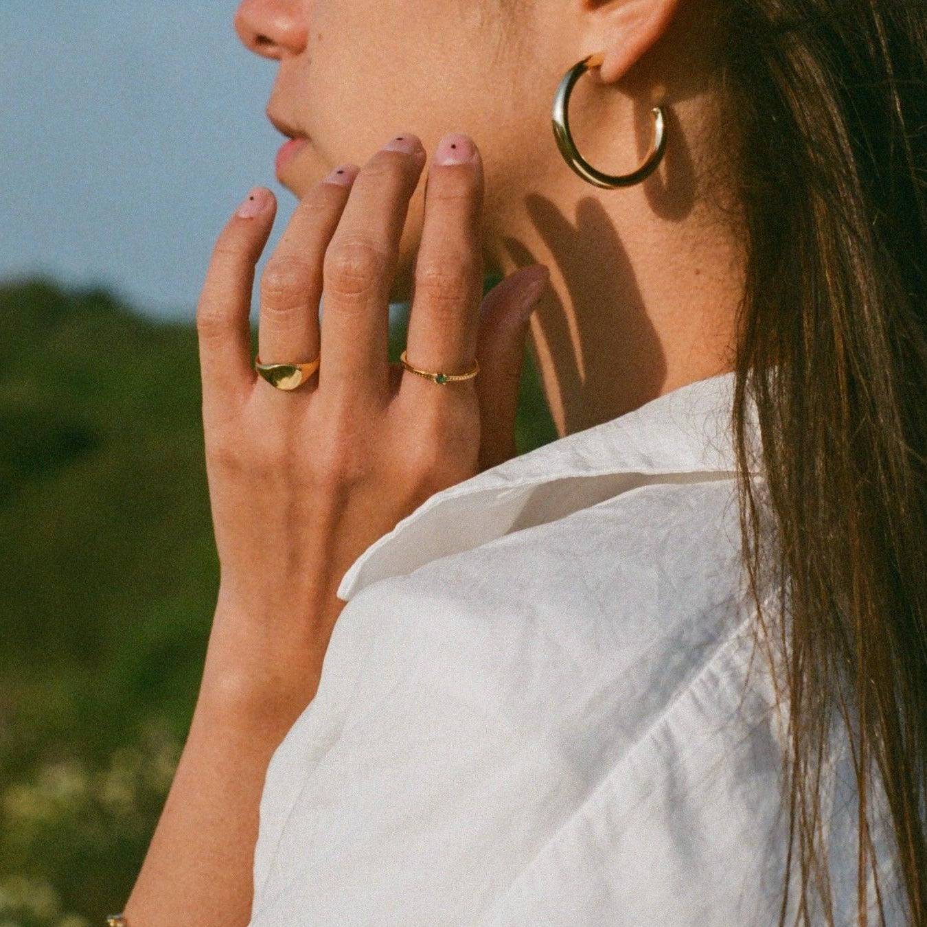 a close up of a person talking on a cell phone 