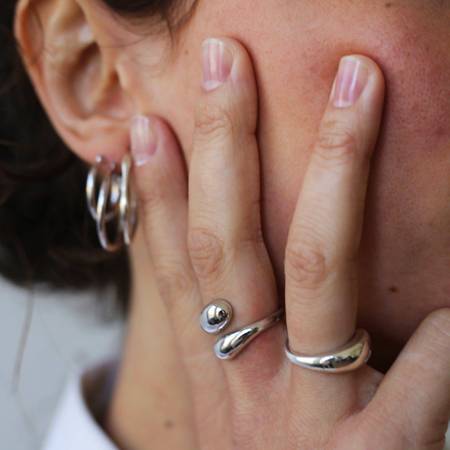 a close up of a person talking on a cell phone